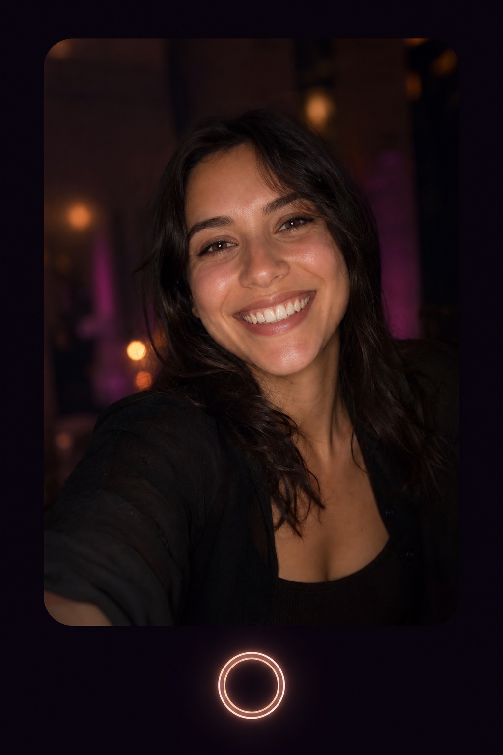 A smiling person photographed with Glowfie face light